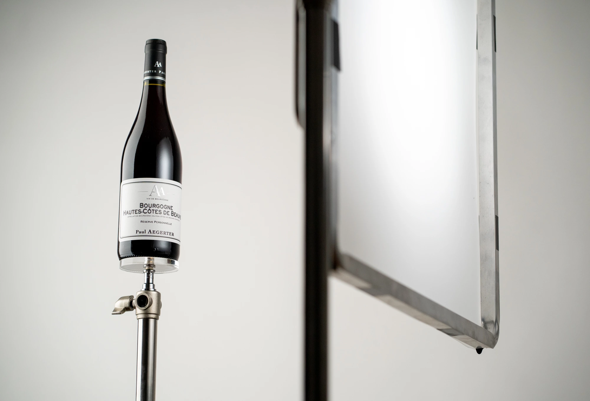 photographie backstage studio mise au point bouteille de vin
